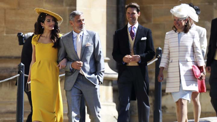 Amal and George Clooney arrive for the wedding ceremony of Prince Harry and Meghan Markle at St. George's Chapel in Windsor Castle in Windsor, near London, England, Saturday, May 19, 2018. (Chris Jackson/pool photo via AP)