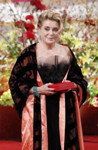 French actress Catherine Deneuve attends an award presentation ceremony for the Praemium Imperiale culture award in Tokyo, Tuesday, Oct. 23, 2018. Deneuve is awarded for her achievement in Theatre and Film. (Kyodo News via AP)
